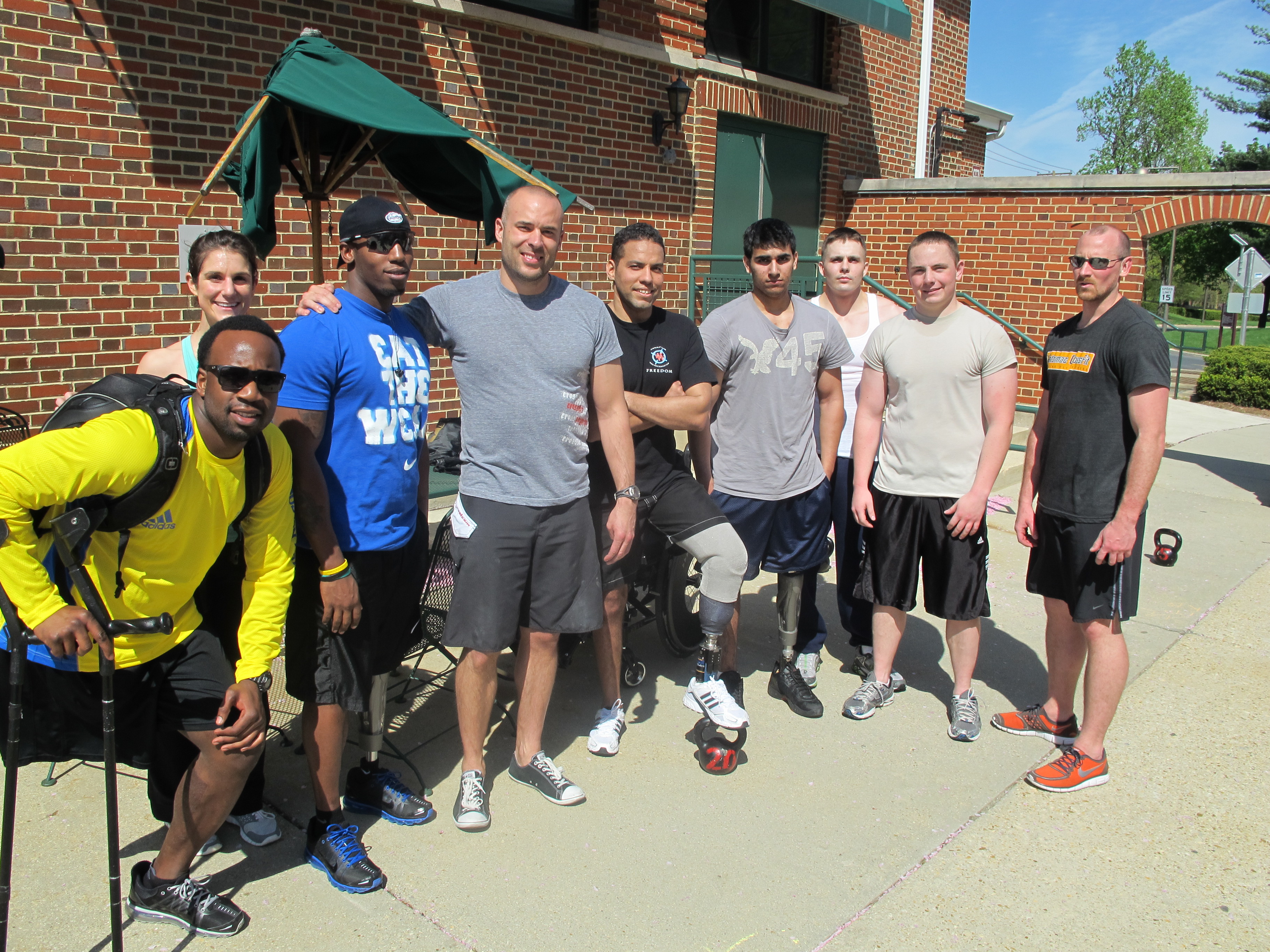 Brian Wilson and Dillon Behr coaching Crossfit at Walter Reed Amputee Center.