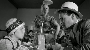 Tatum O'Neal and Ryan O'Neal in PAPER MOON. "Just because a man meets a woman in a bar room don't make him your pa!"